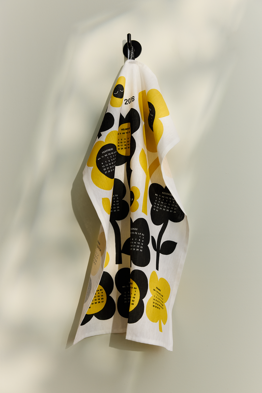 Kukkariemu kalenteri keittiöpyyhe loistopaivat